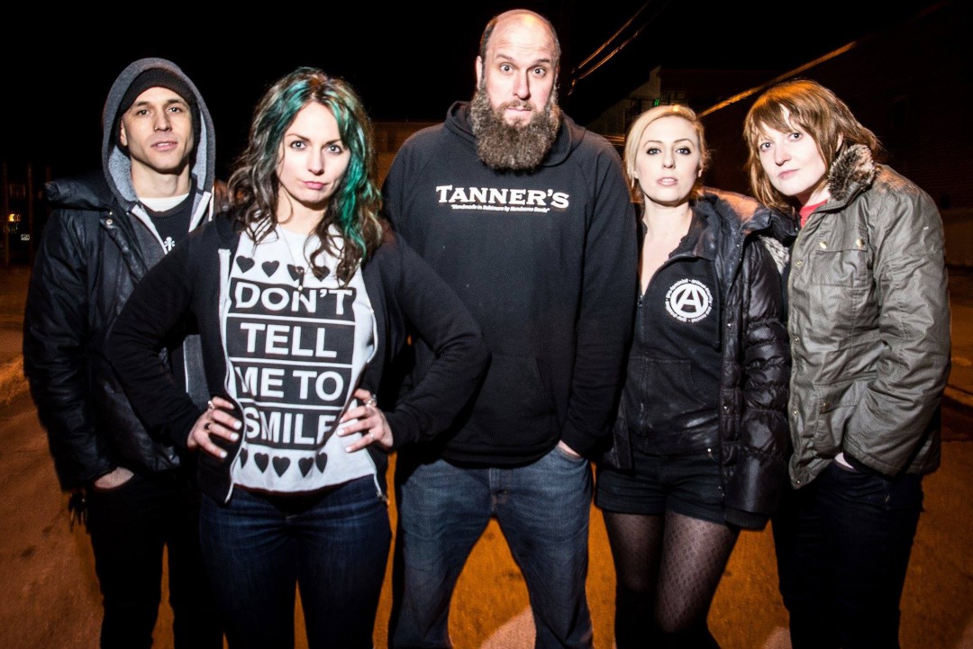 War on Women sign to Bridge Nine