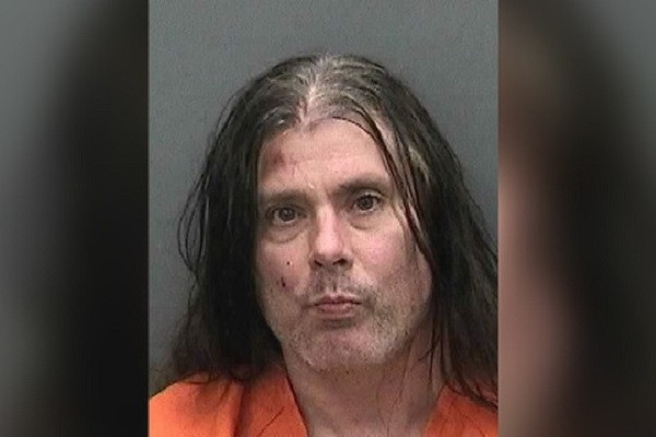 Cannibal Corpse guitarist arrested for burglary, assaulting police while his house blows up